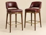 Lounge Spectator Stool (pair) in Oxblood leather and walnut — main photograph