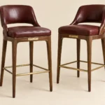 Lounge Spectator Stool (pair) in Oxblood leather and walnut — main photograph